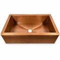 Hammered copper farmhouse kitchen sink, top view showing the bowl and 3.5 inch drain hole
